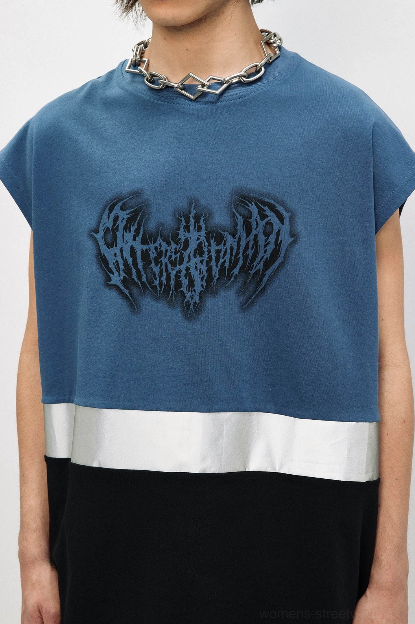 Oversized neon graphic tank top with reflective detail inspired by Korean and Seoul street fashion