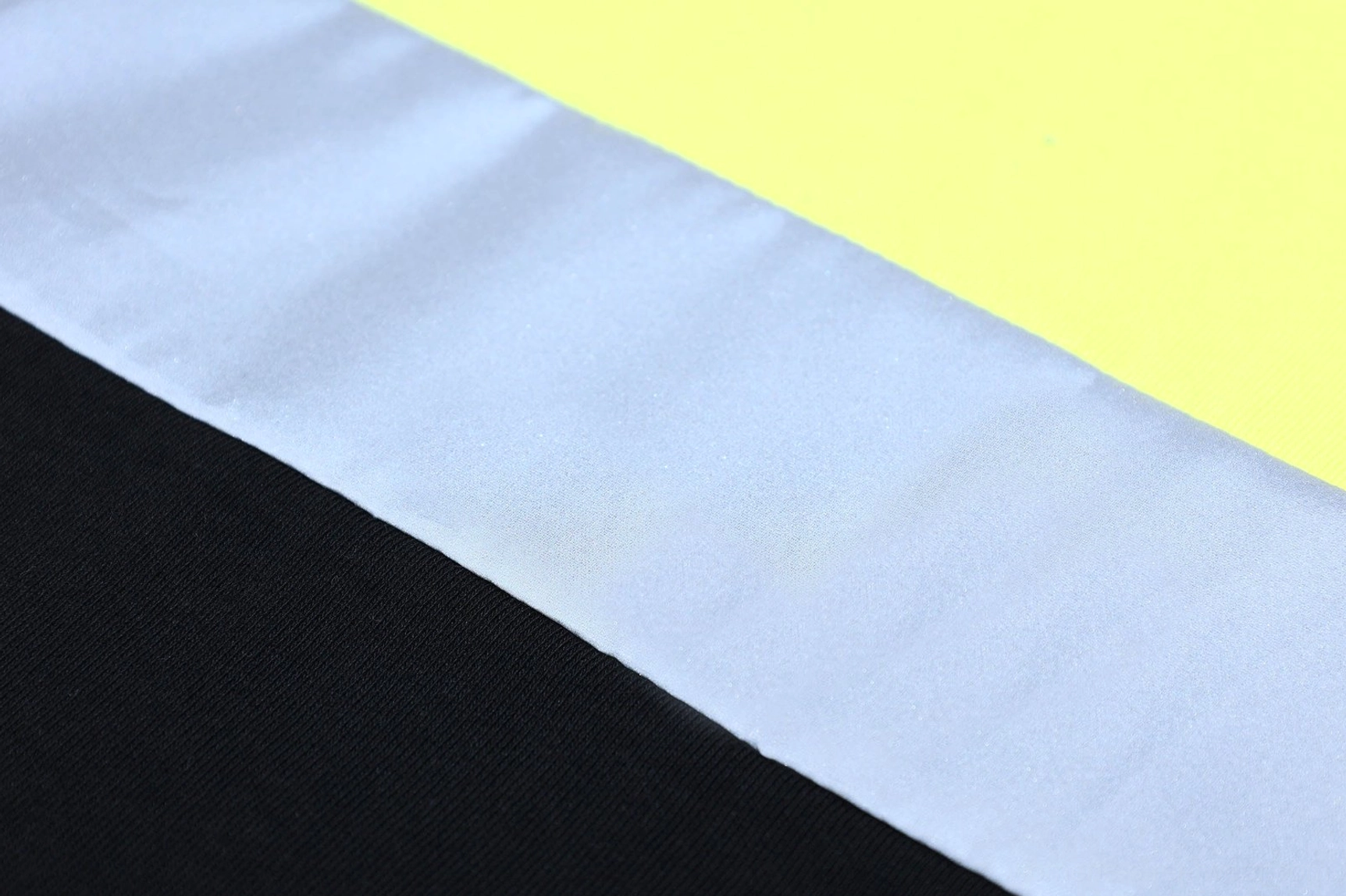 Neon gothic streetwear tank top with a relaxed silhouette and high-contrast colorblock design