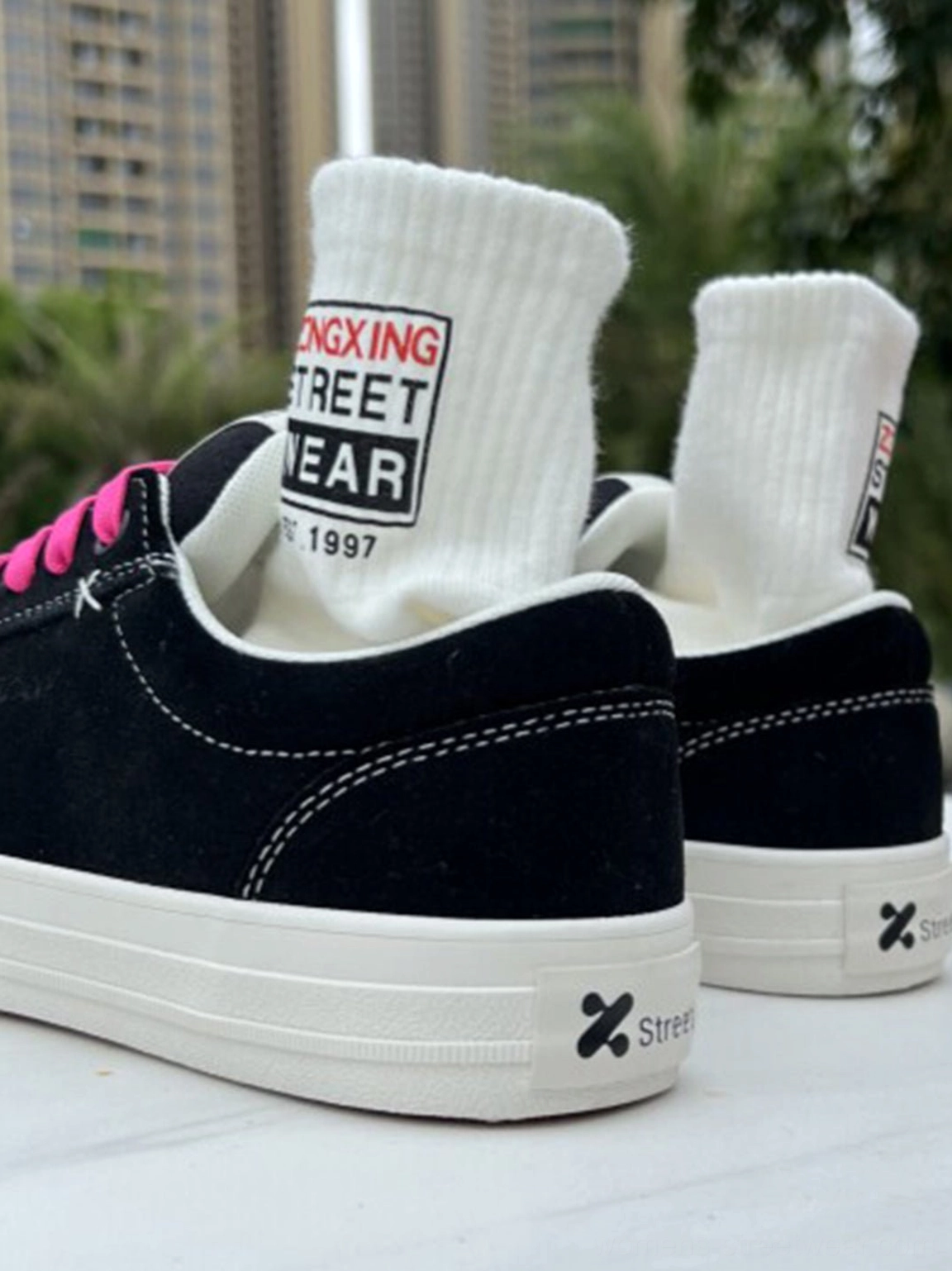 Neon lace black suede platform canvas sneakers with a bold low-top streetwear design and thick white rubber outsole