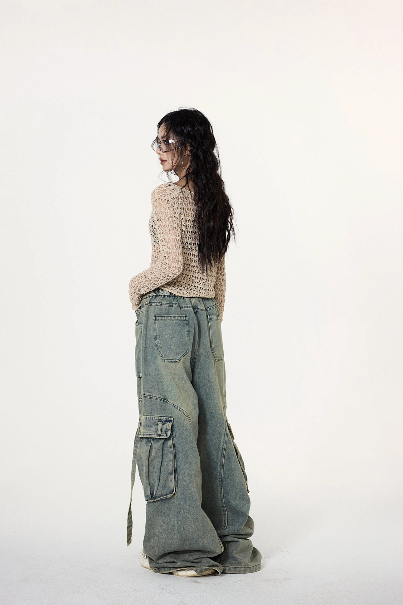 Neutral beige khaki crochet crop cardigan with front buttons and breathable hollow-out knit construction