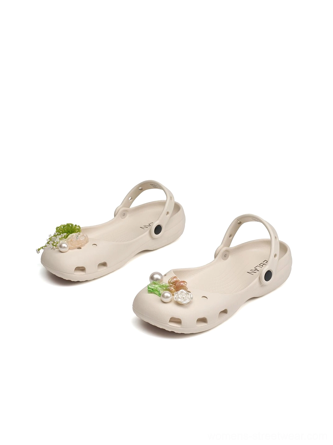 Neutral beige Mary Jane style slide sandals with open breathable design raised sole and decorative toe details for casual outfits
