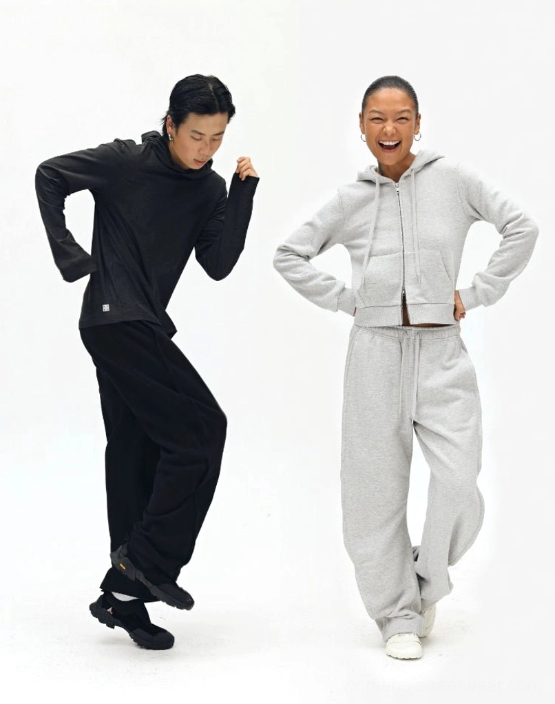 Neutral tone streetwear loungewear sets - black and heather gray pieces with relaxed wide leg silhouette