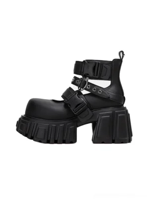 Single black buckled platform ankle boot with chunky lug sole, adjustable straps, matte coated leather upper, and punk goth streetwear styling