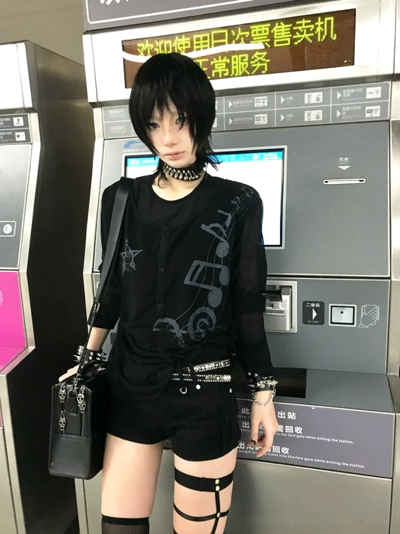 Black layered punk goth Henley long sleeve top with star graphic and sheer mesh sleeve streetwear outfit