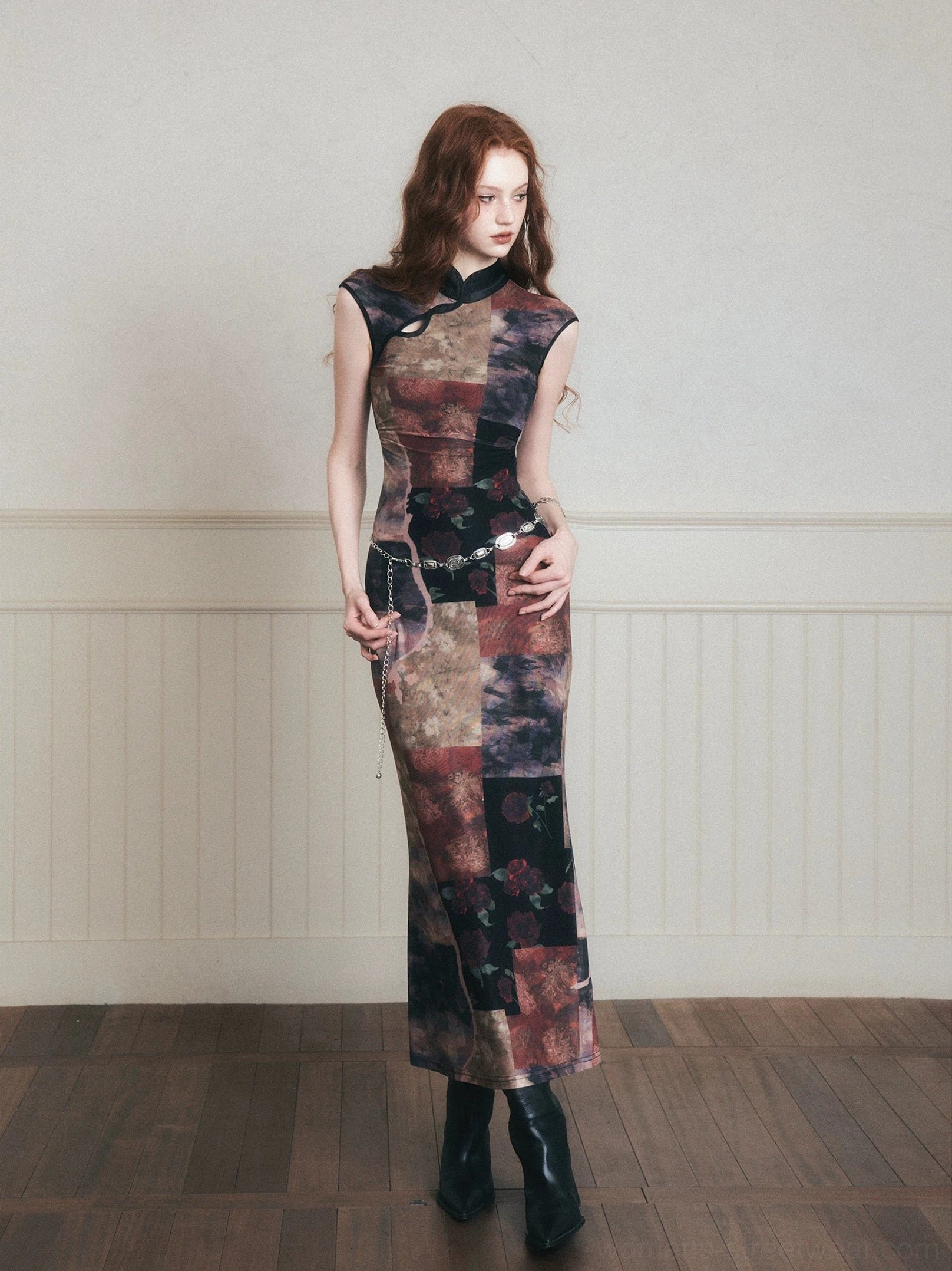 Front view of noir patchwork qipao-inspired stretch mesh maxi dress with Mandarin collar and asymmetric shoulder cutout
