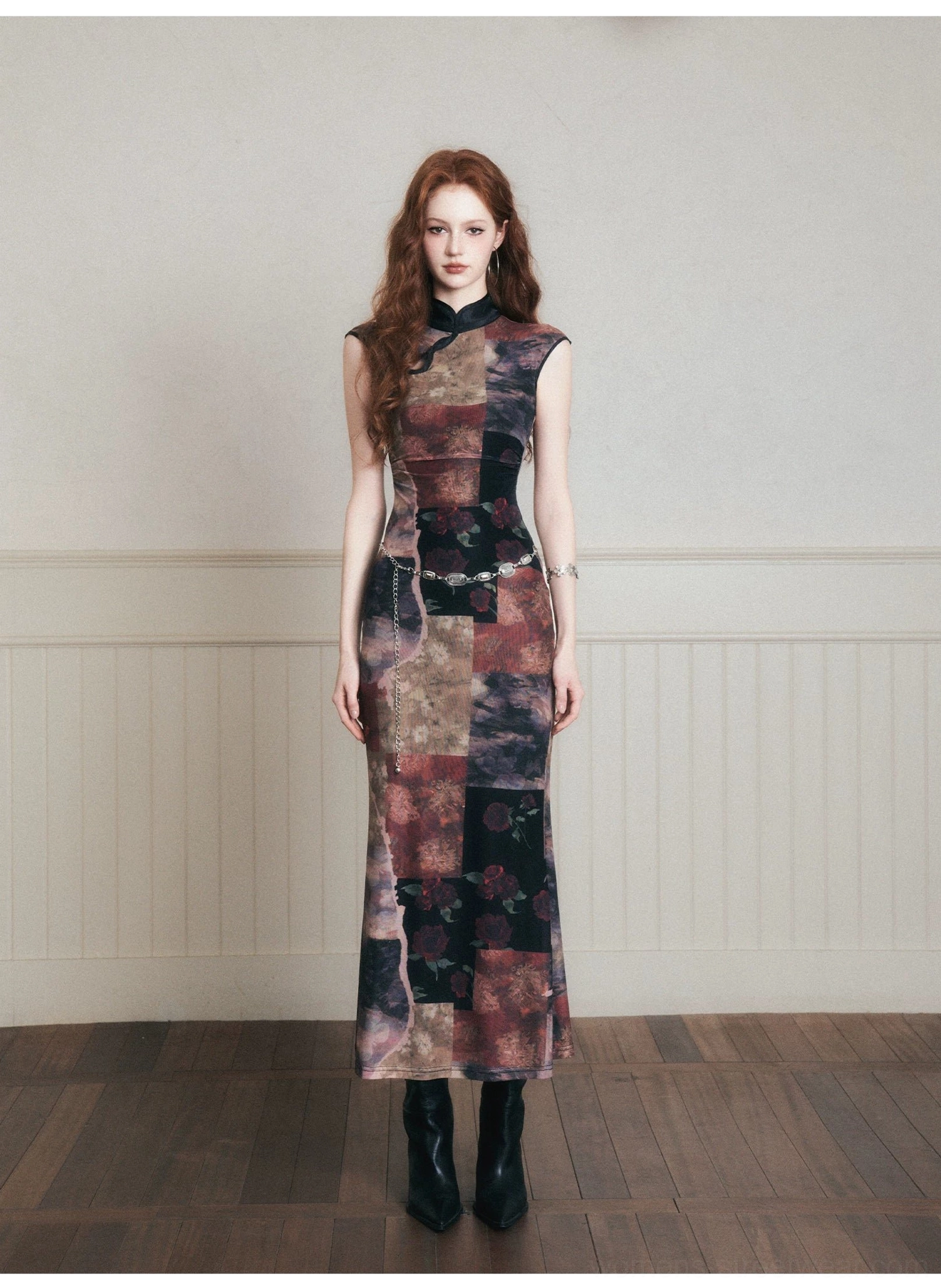 Noir patchwork qipao-inspired maxi dress detail with Mandarin-style stand collar and asymmetric cutout neckline
