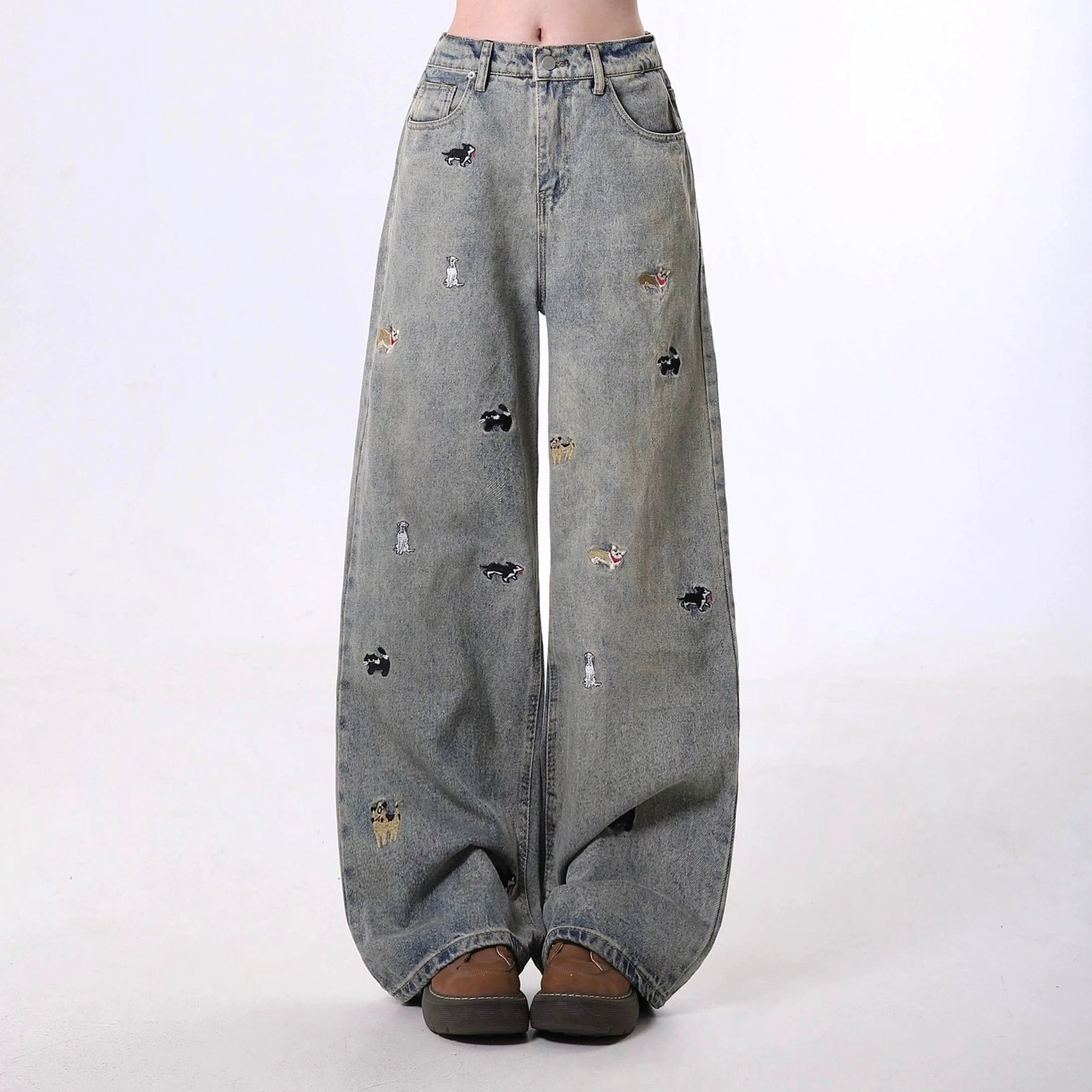 Nostalgic blue washed denim wide leg jeans with cute all over dog embroidery straight front full view