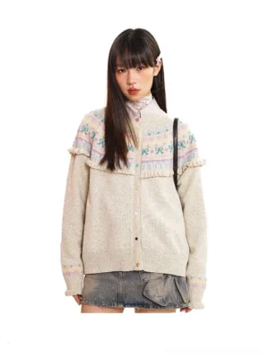 Oatmeal beige Fair Isle crochet knit cardigan with patterned shoulder yoke, ruffled trim, button front, and distressed denim mini skirt