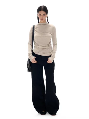 Oatmeal fitted mock neck long sleeve knit top showing the streamlined side and back silhouette with extended sleeves
