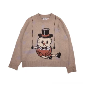 Oatmeal khaki puppet swing piglet jacquard knit sweater with relaxed drop shoulder fit and ribbed crew neck