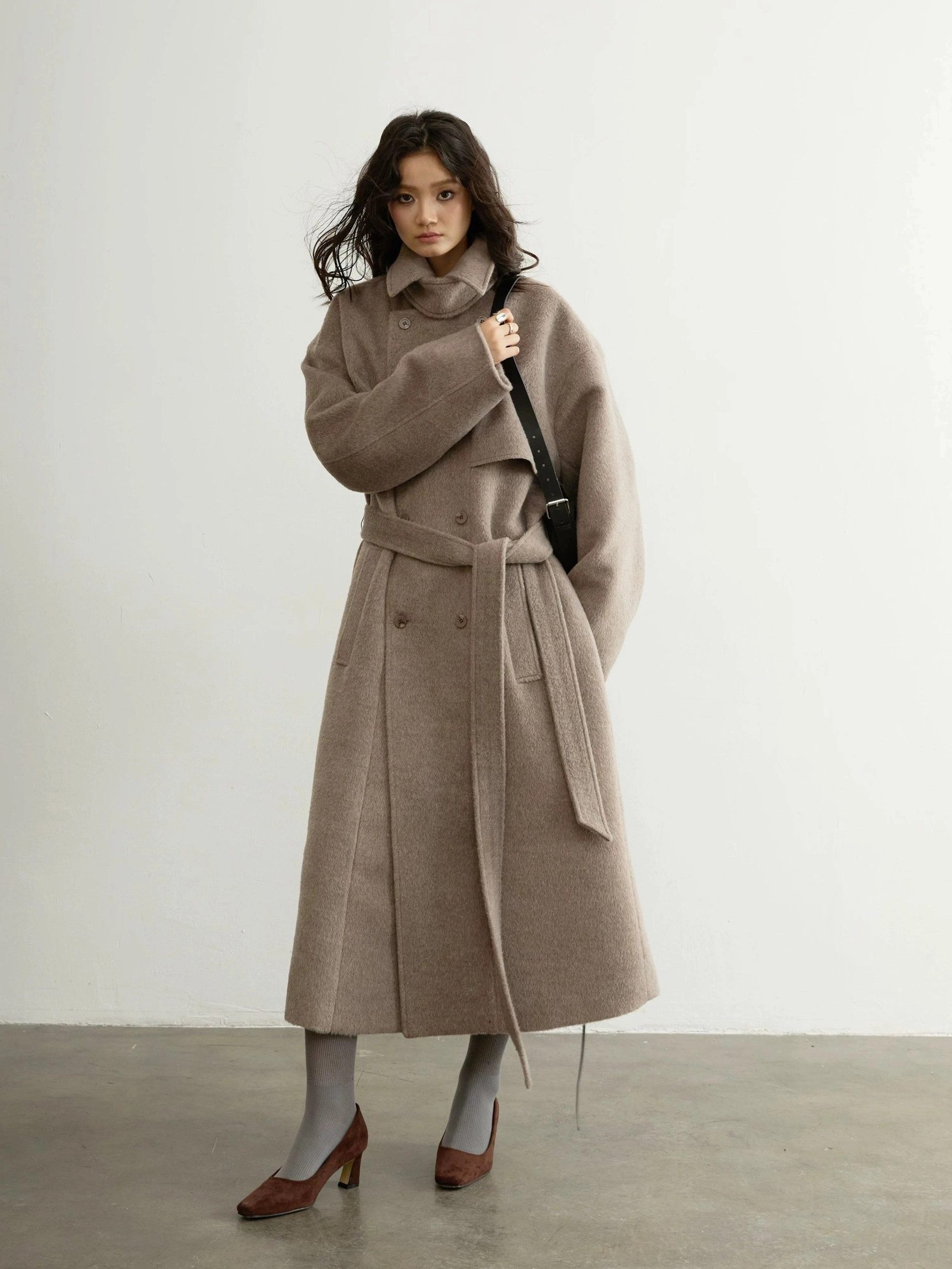 Oatmeal tailored double-breasted belted wool blend trench coat full front view styled with heels