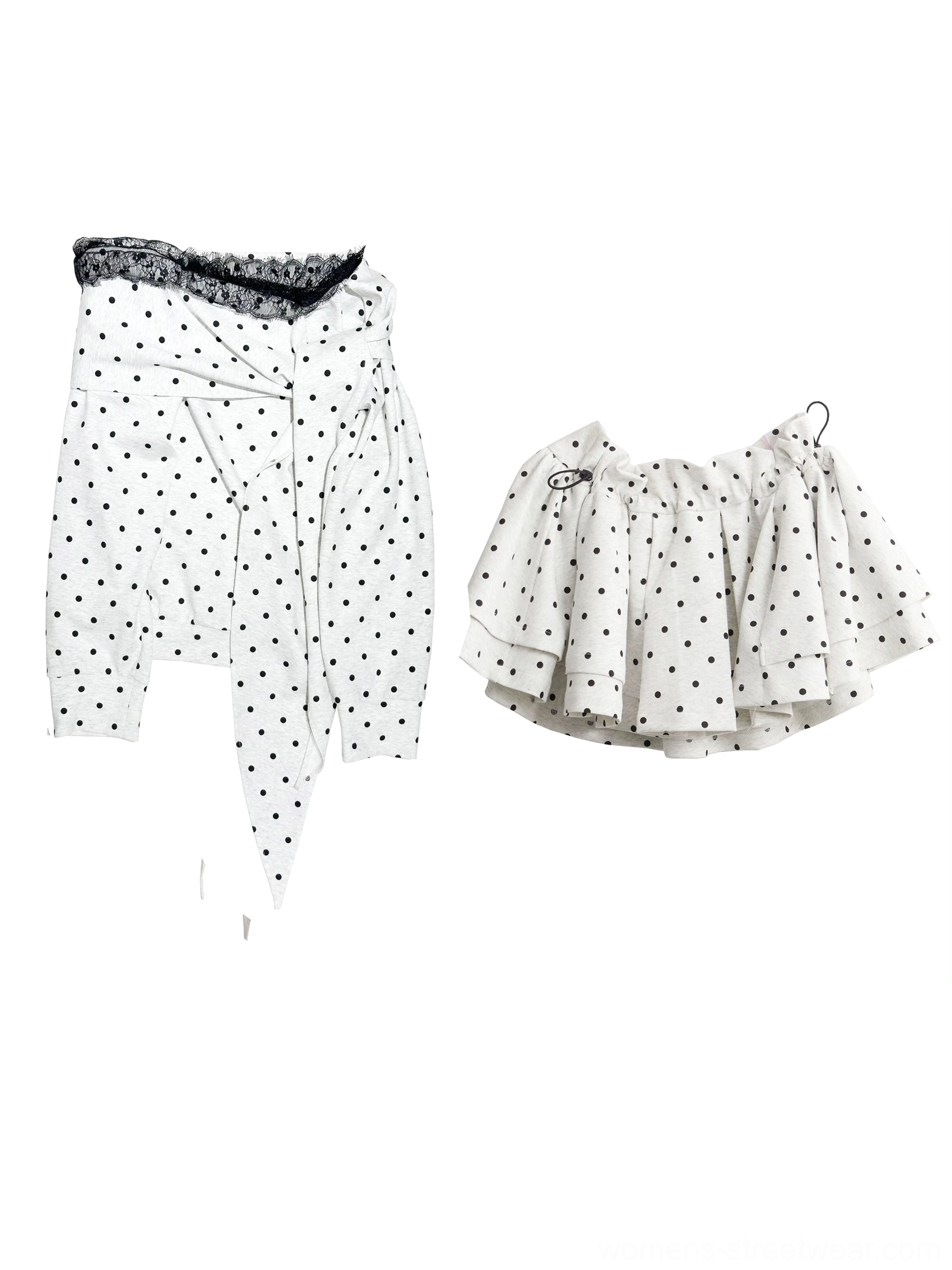 Flat lay of matching off-white black polka dot peplum top and flared ruffle skirt with lace trim and adjustable tie fastenings