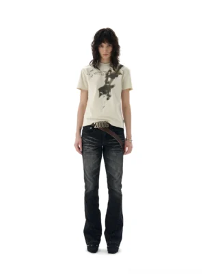 Front view of an off white burnt guitar graphic T-shirt styled with dark flared jeans in a minimalist streetwear look