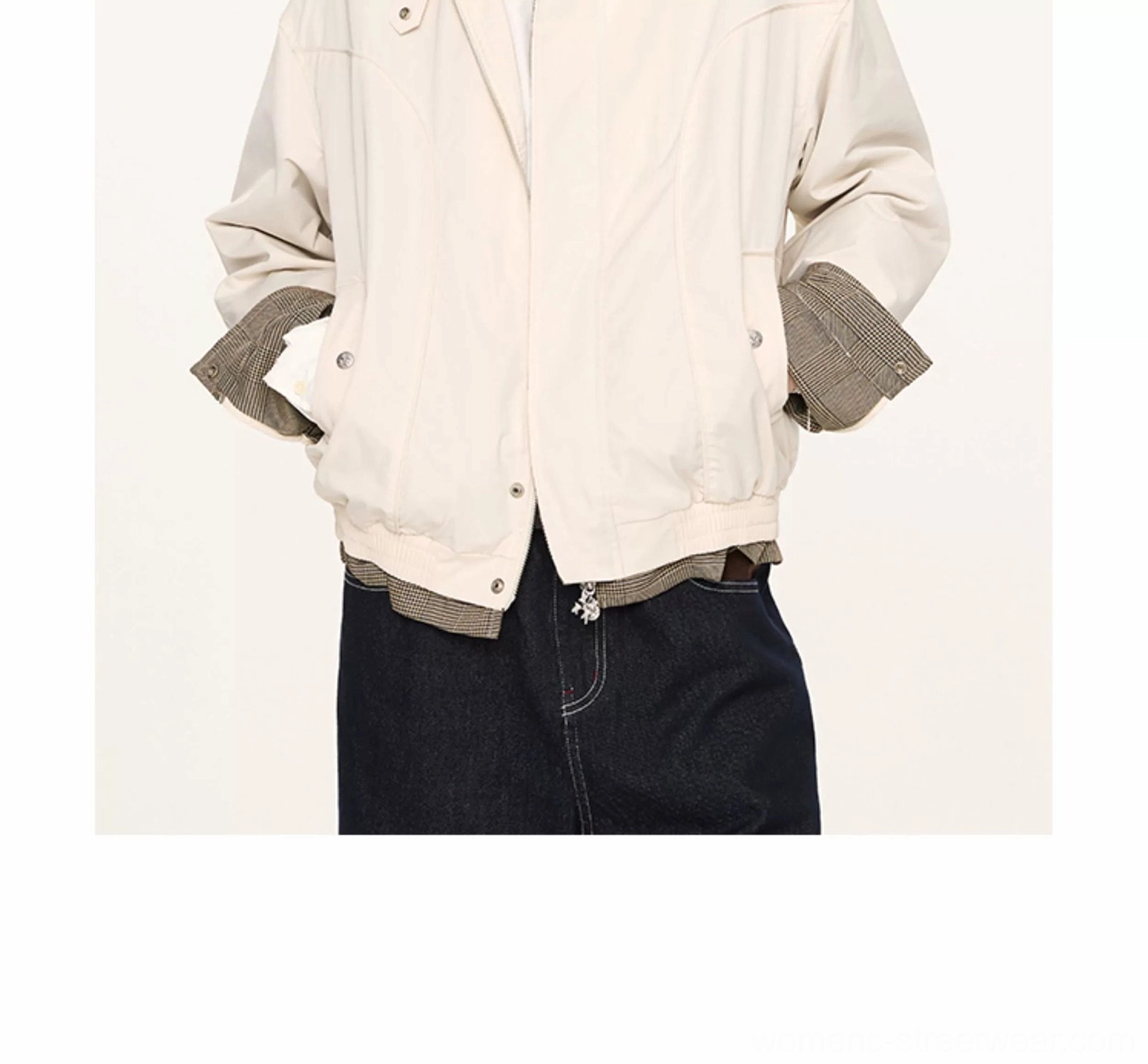 Back three-quarter view of off-white cropped Harrington jacket showing contrast grey cuffs and side pocket details