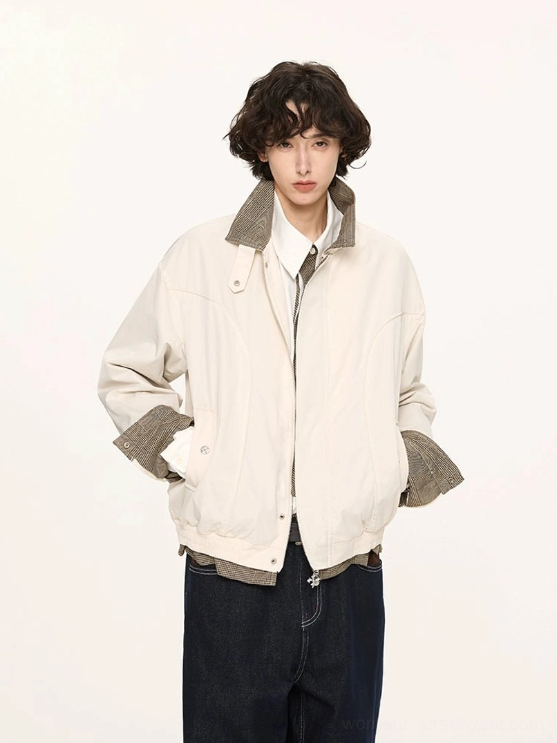 Off-white Harrington jacket with contrast grey collar and cuffs styled over a white shirt with dark denim jeans