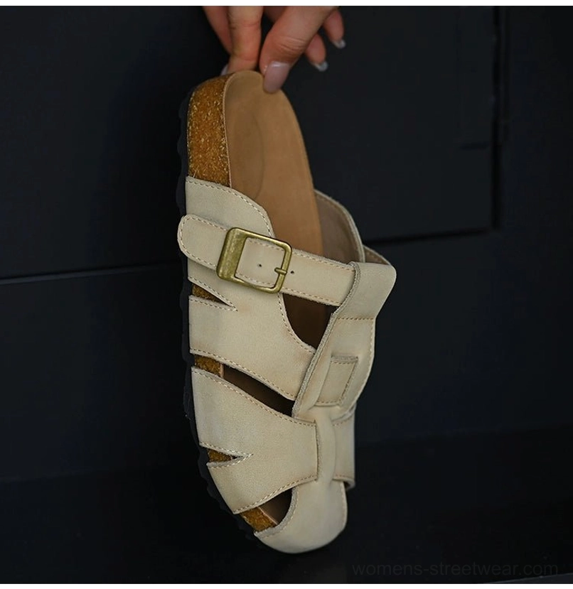 Off-white leather fisherman sandals with multi-strap cutout upper, adjustable gold-tone buckle, cushioned footbed, cork-style midsole, and rubber outsole