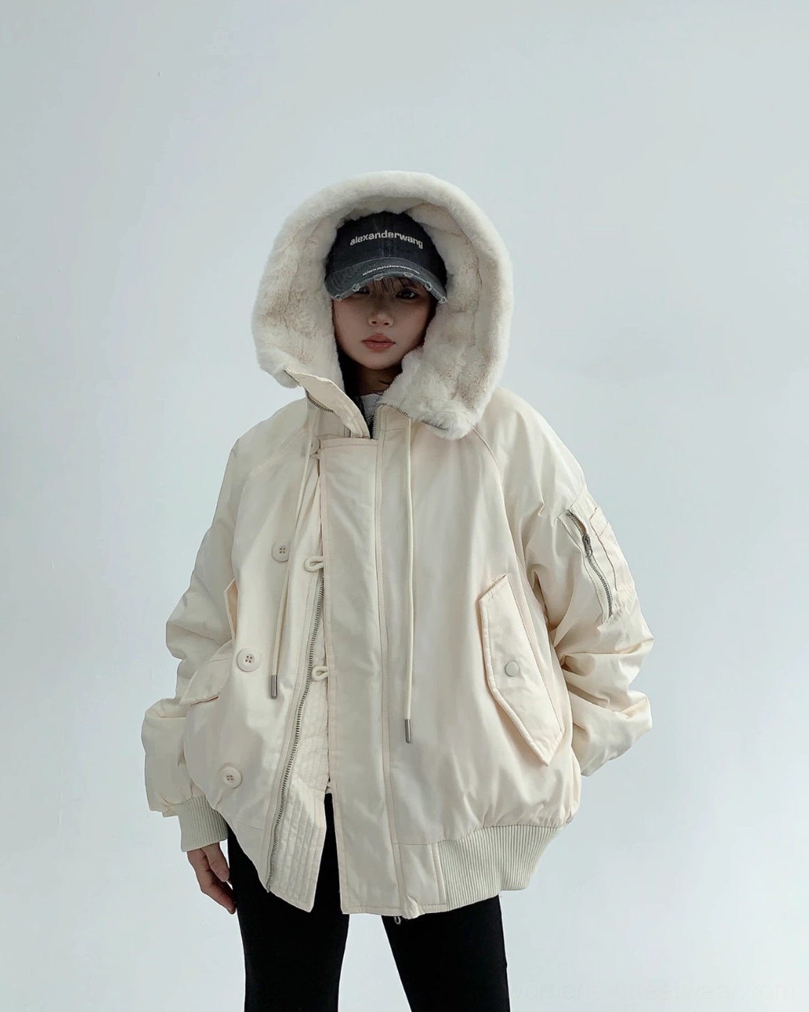 Off-white oversized sherpa-lined bomber jacket with hood and plush faux-shearling interior for winter streetwear layering