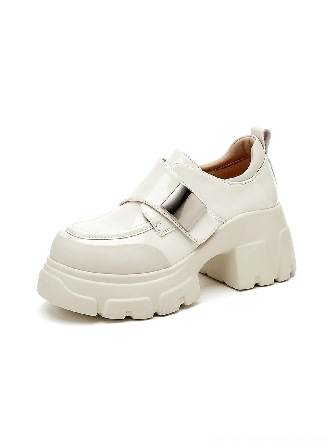Off-white patent platform Mary Jane shoes with rounded toe, chunky lug sole, and adjustable strap