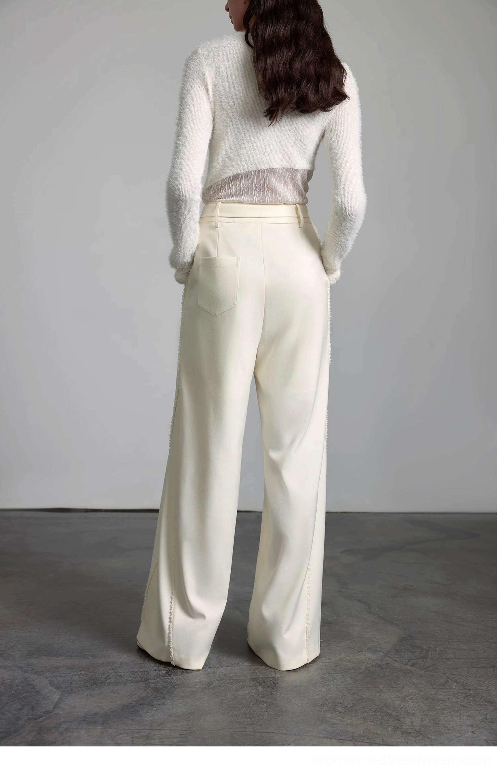 Full back view of off-white tailored wide-leg trousers with back pockets and a clean structured waist