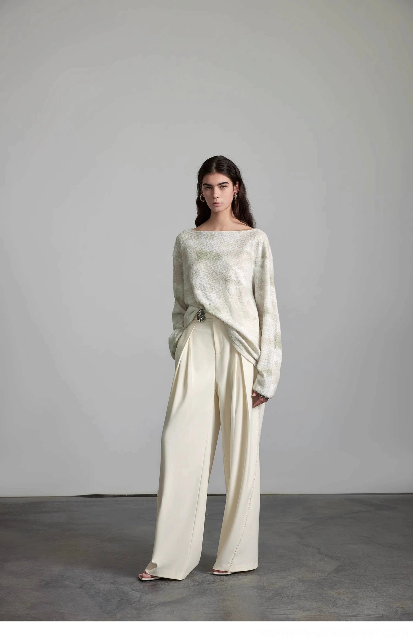 Off-white wide-leg streetwear pants product image highlighting the smooth matte fabric and minimalist design