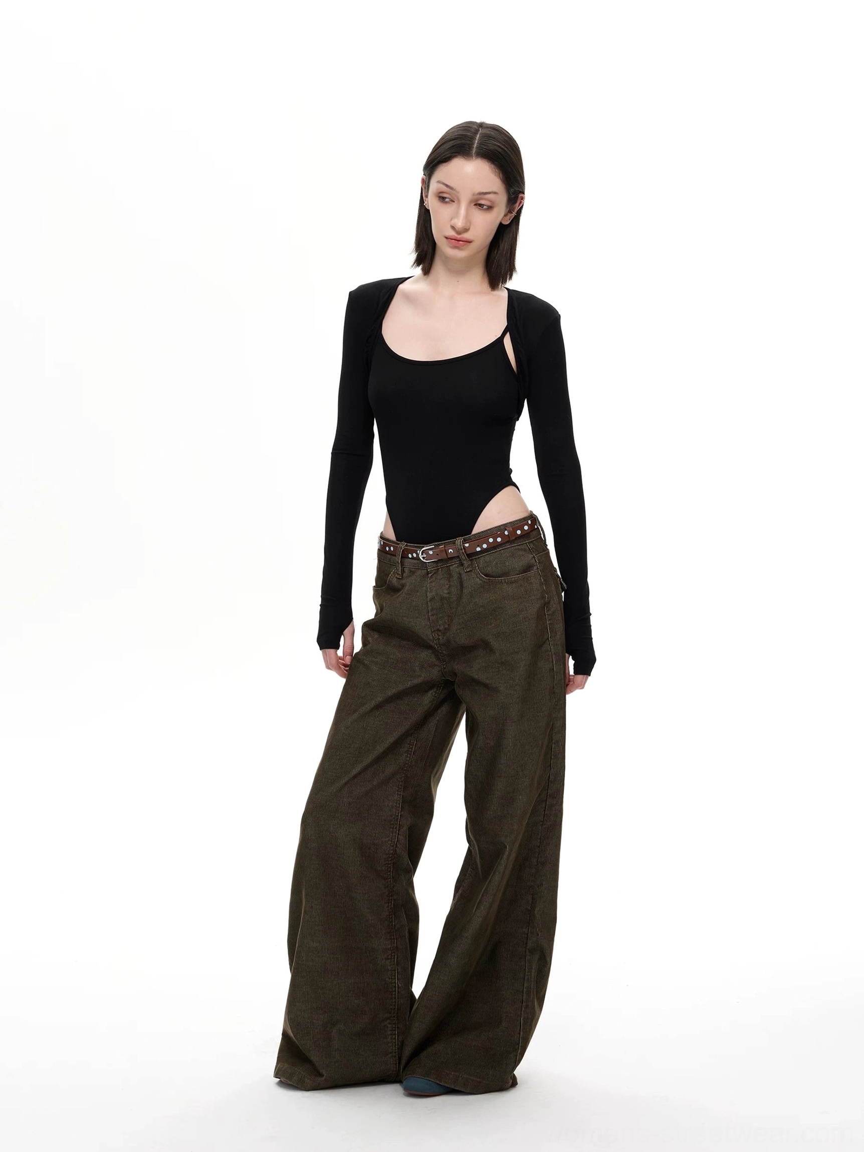 Olive wide leg corduroy streetwear pants styled with black cutout top and belt for a Y2K inspired outfit