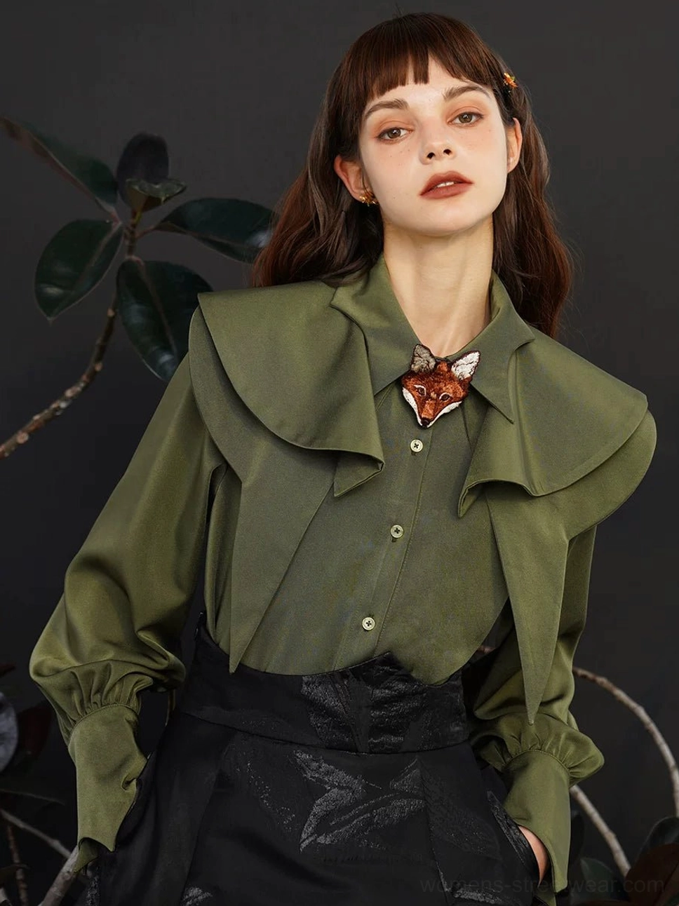 Olive green detachable cape collar blouse styled with a black jacquard midi skirt, layered collar, button front, long sleeves, and fox brooch detail