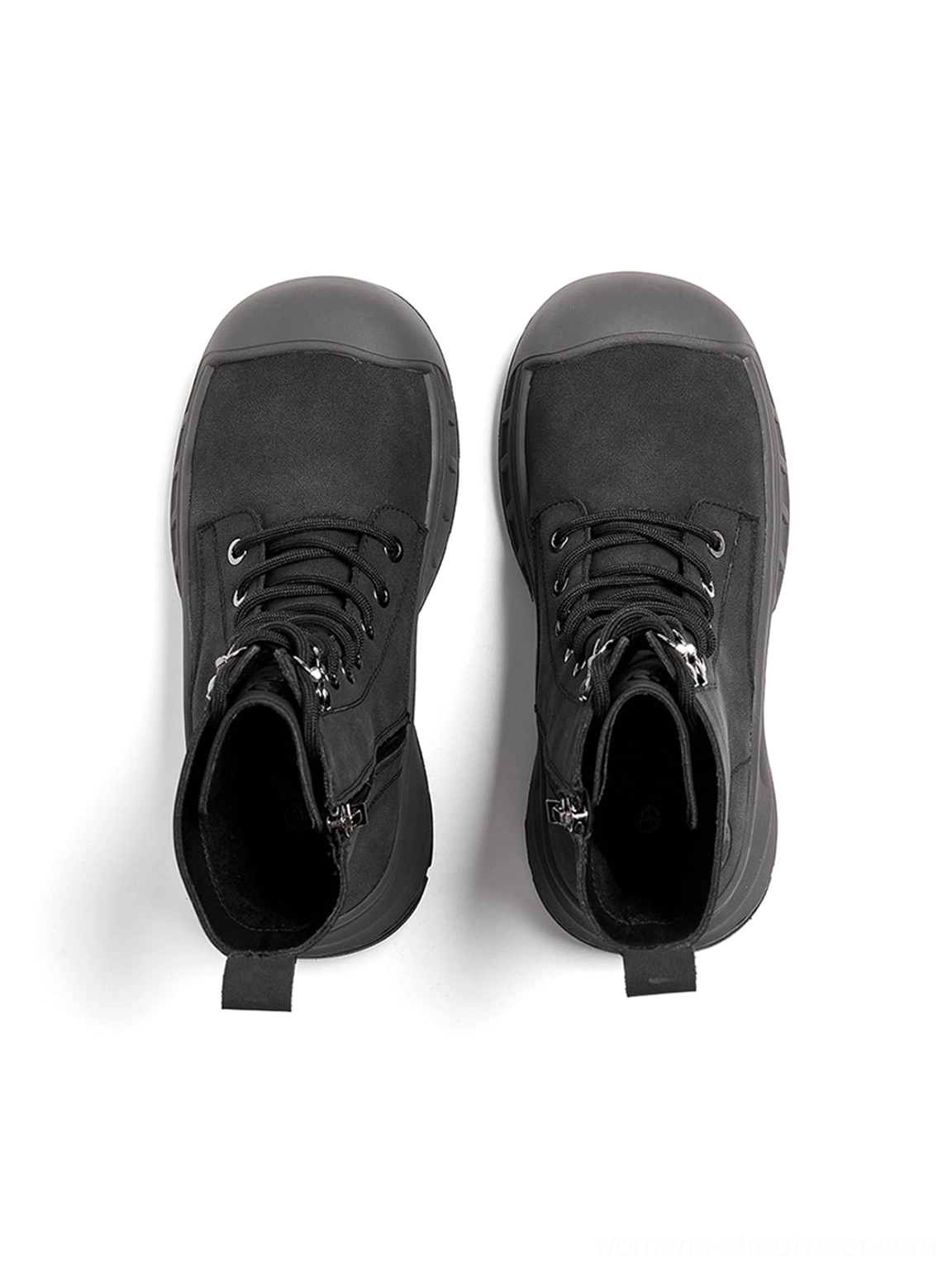 Olive green combat boots with black laces reinforced toe and elevated platform sole
