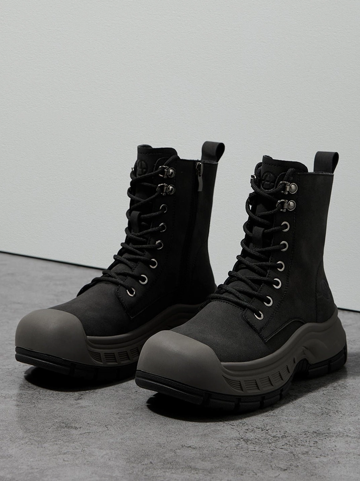 Olive green reinforced toe platform combat boots tall shaft profile view