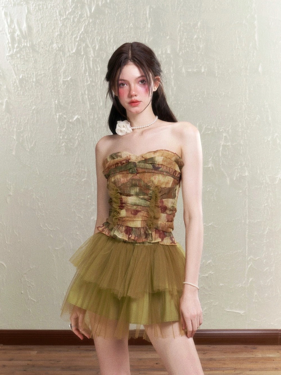 Olive green watercolor rose print corset top and layered tulle mini skirt shown from a slight side front angle