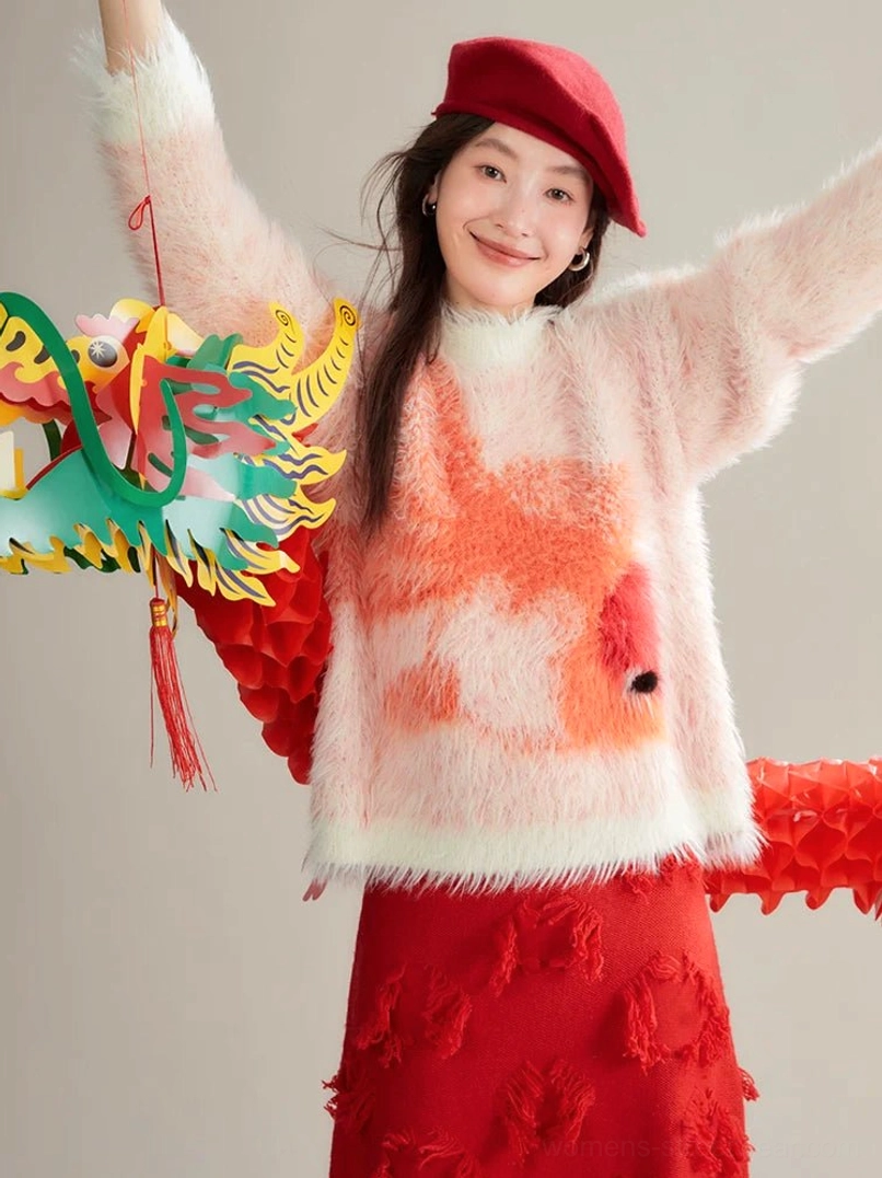 Front view of orange-red koi graphic sweater styled with a red beret and festive East Asian inspired accessories