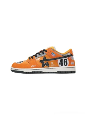 Orange star-panel racing skate sneaker side view with black No. 46 graphic, black laces, orange suede upper, and low-profile rubber sole