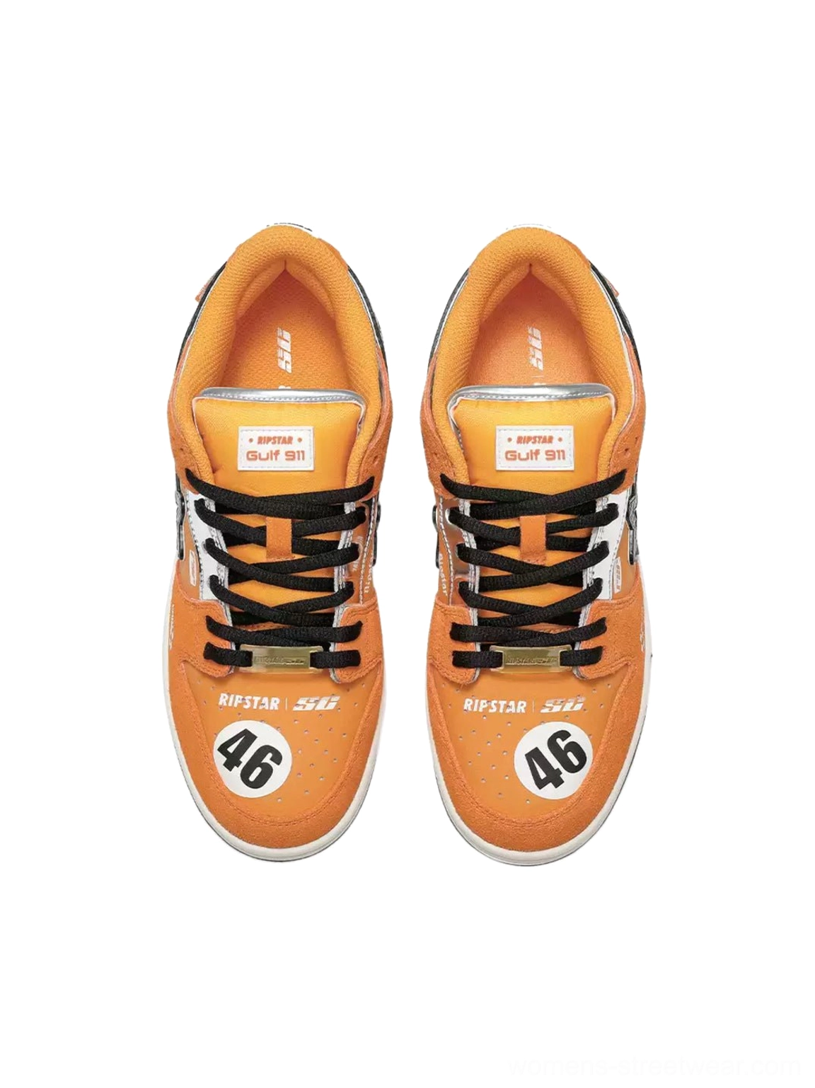 Top-down view of orange racing-inspired skate sneakers with black laces, orange suede uppers, graphic tongue labels, and No. 46 motorsport details