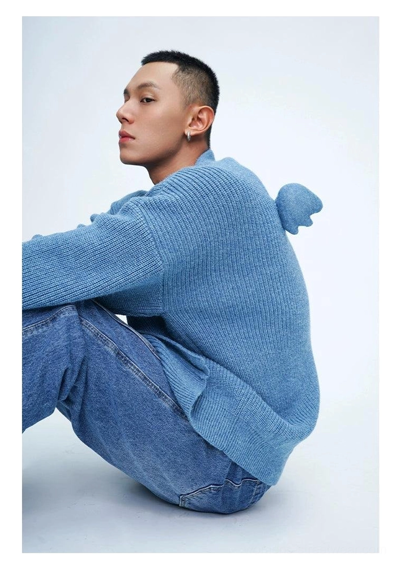 Denim blue oversized angel wing pom-pom fuzzy knit cardigan relaxed streetwear fit on male model