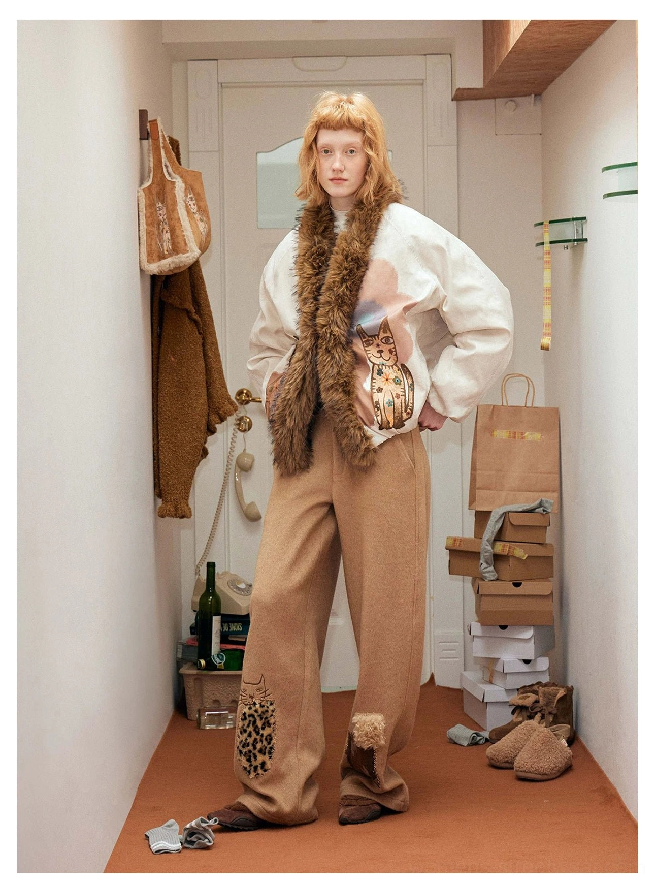 Oversized beige cat print bomber jacket with brown faux fur trim styled with khaki wide leg pants
