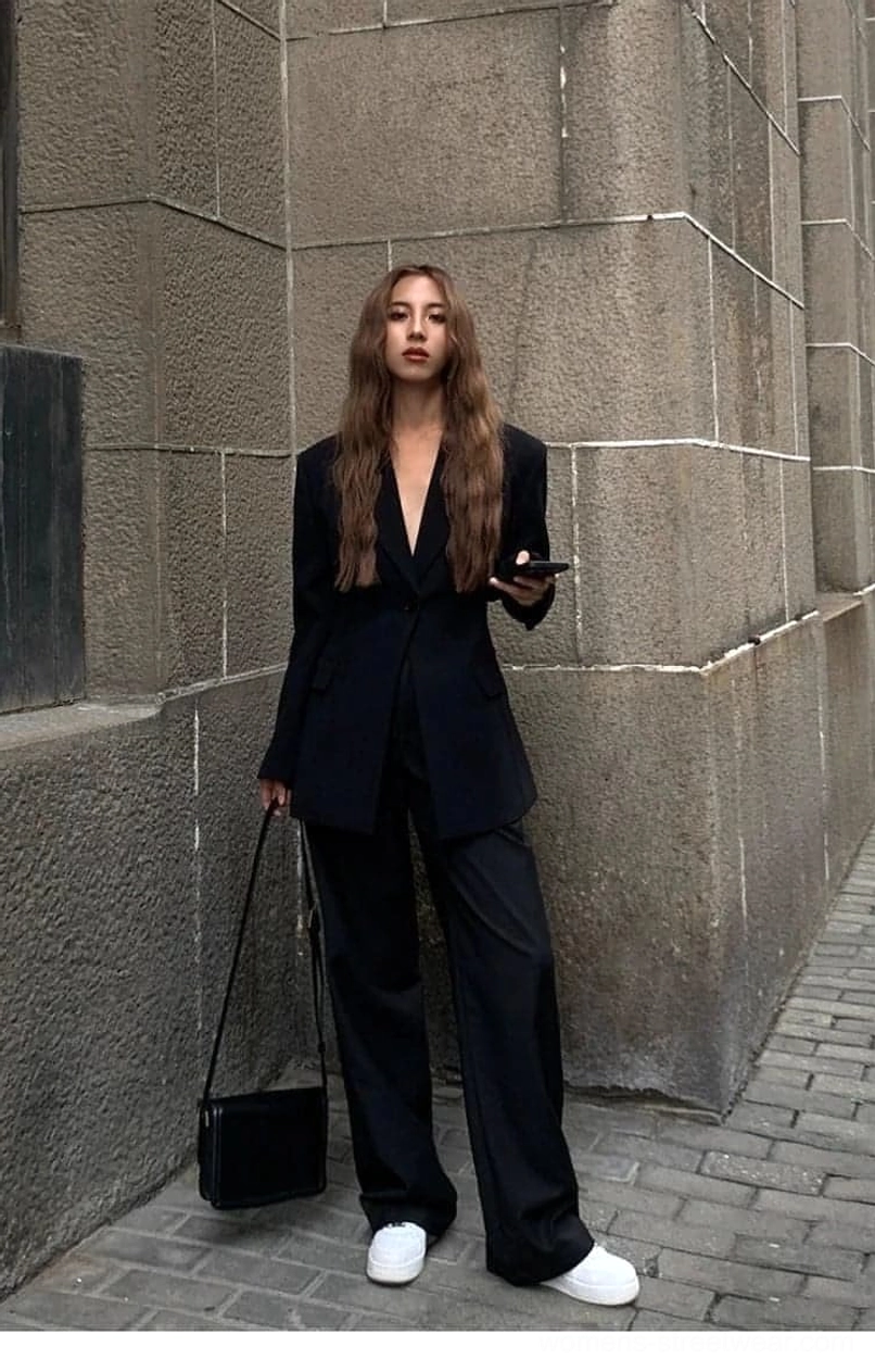 Black oversized streetwear blazer jacket with notched lapel and single-button closure detail