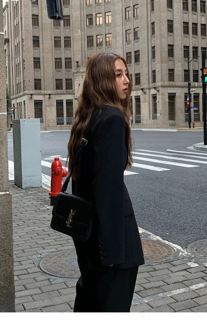Women's black oversized blazer jacket styled as a monochrome tailored streetwear suit with trousers