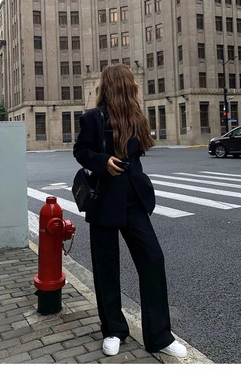 Black single-button oversized blazer jacket with padded shoulders and relaxed fit detail