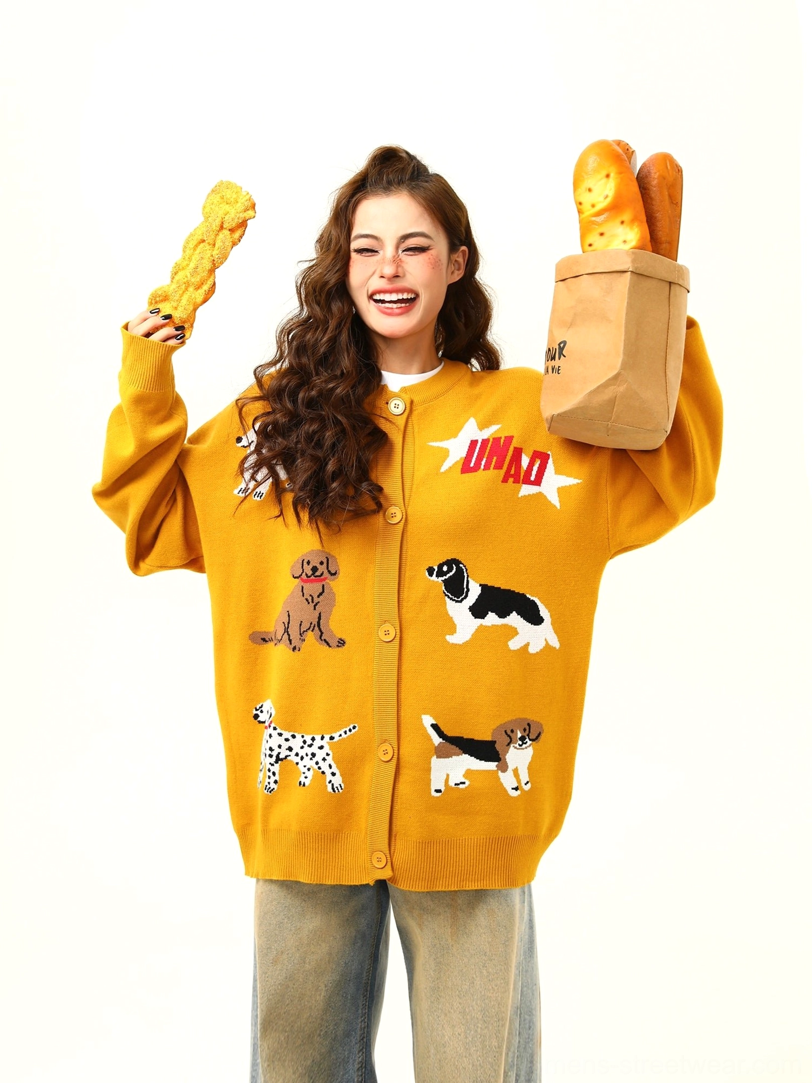 Yellow oversized cartoon puppy knit cardigan with red letter graphics shown from the front