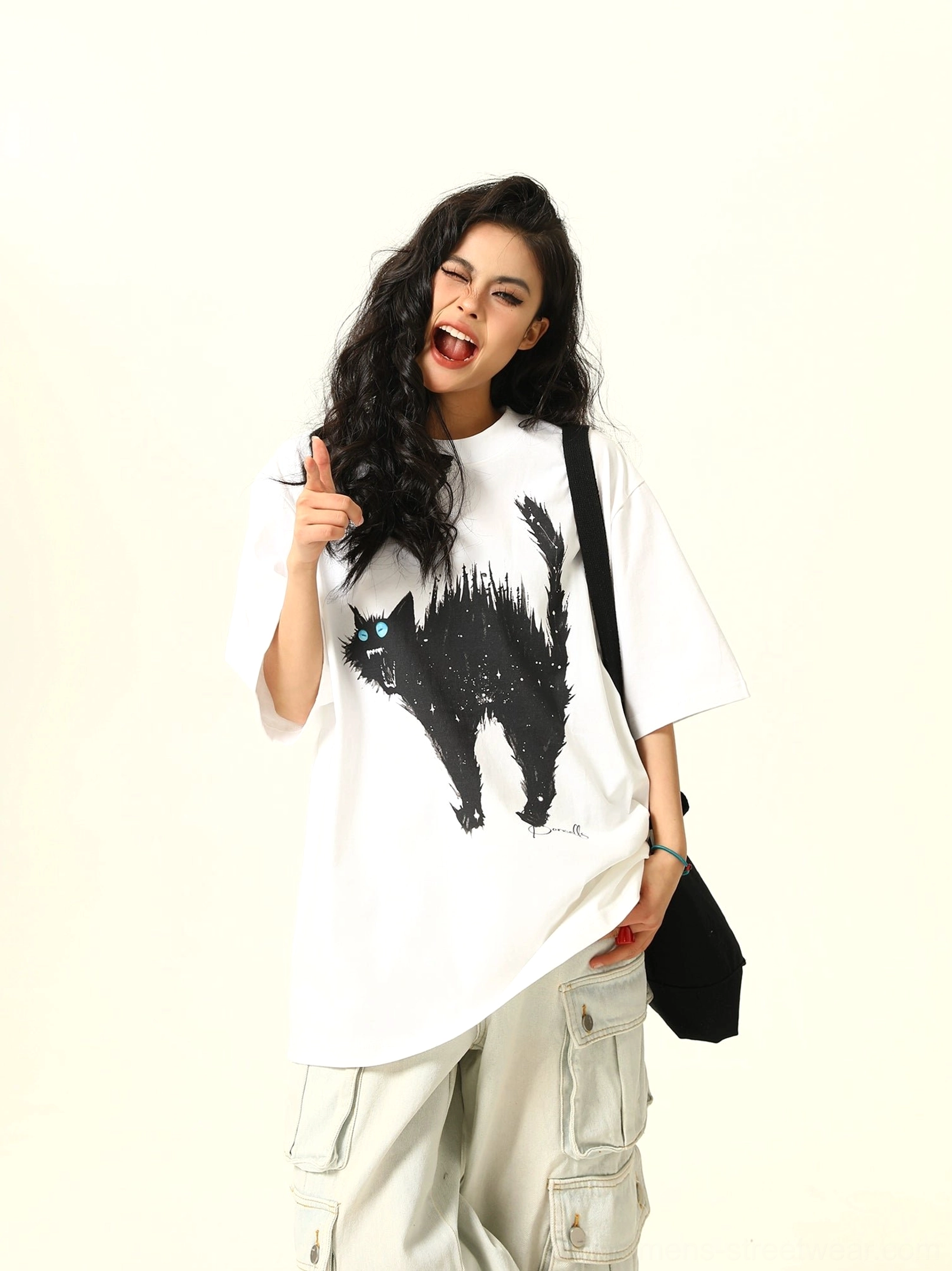Oversized cat graphic T-shirt in a relaxed streetwear silhouette with bold feline artwork and contrasting monochrome color design