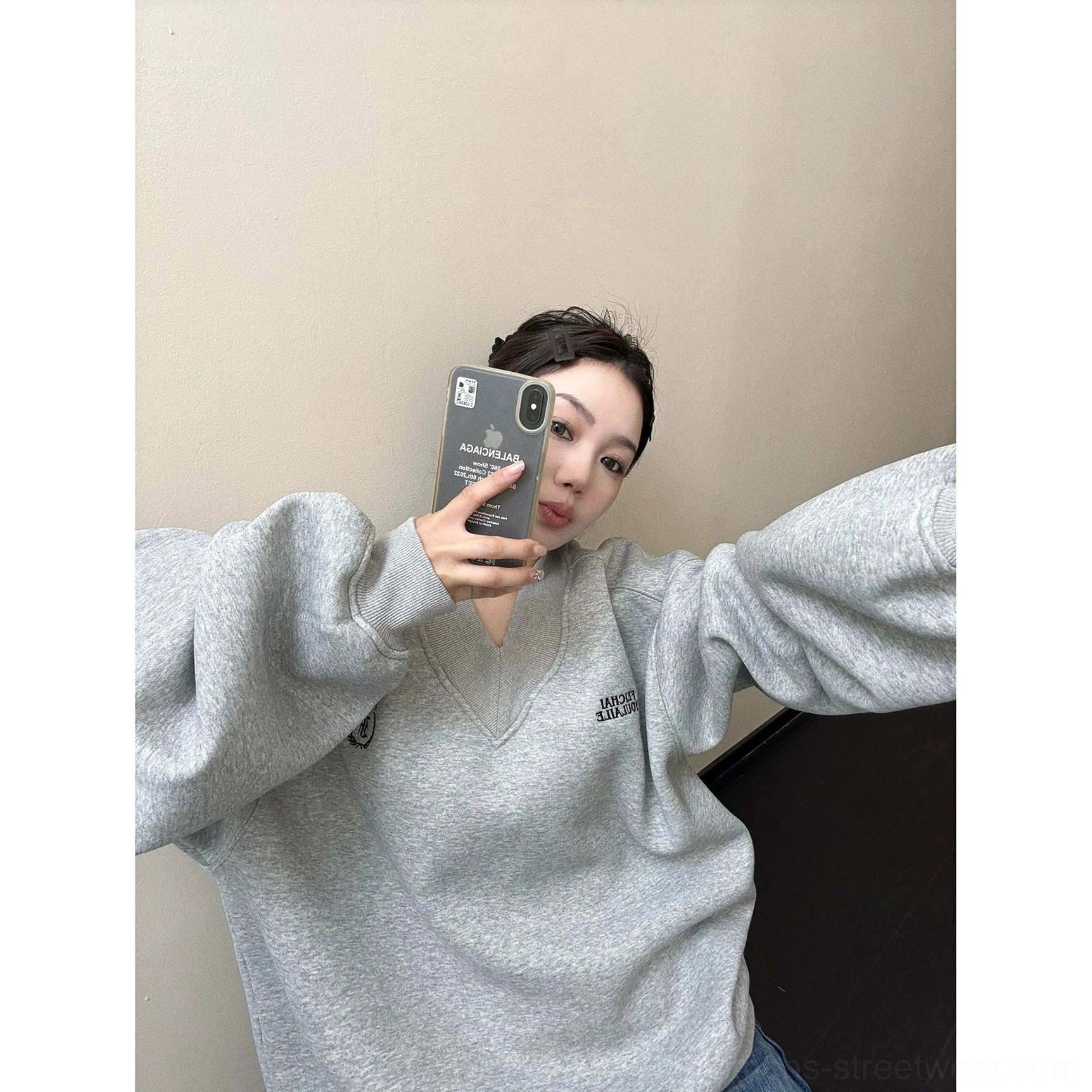 Heather gray oversized collegiate V-neck sweatshirt with ribbed collar and voluminous long sleeves