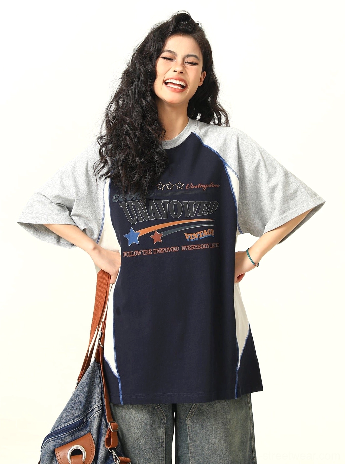 Blue oversized colorblock raglan graphic T-shirt with grey sleeves white trim and collegiate chest design