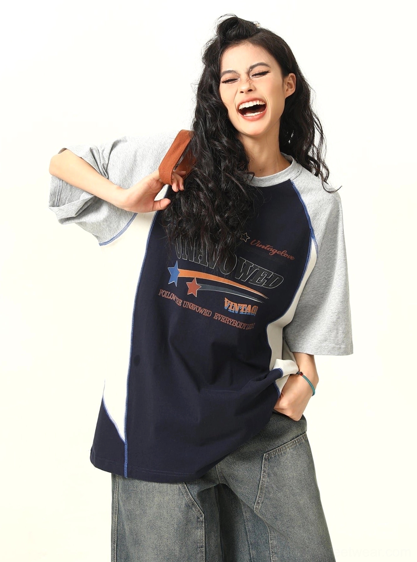 Oversized colorblock raglan graphic T-shirt with contrast sleeve and chest print detail