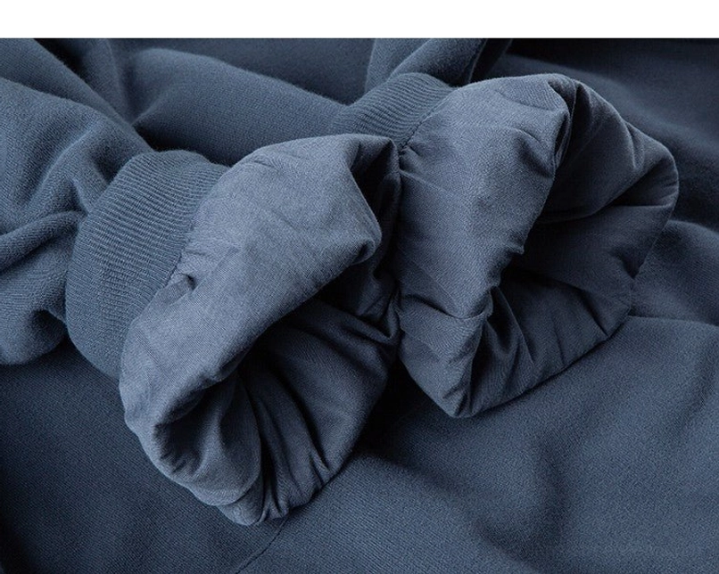 Contemporary oversized cropped fleece-lined hoodie gallery image with minimalist solid-color streetwear design