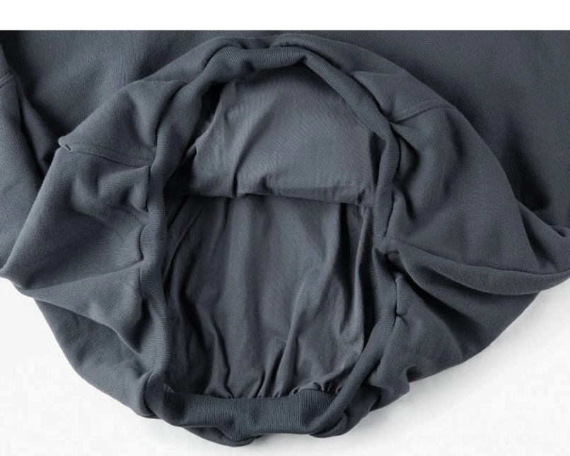 Unisex oversized cropped fleece-lined hoodie product image with minimalist design and contemporary city streetwear appeal