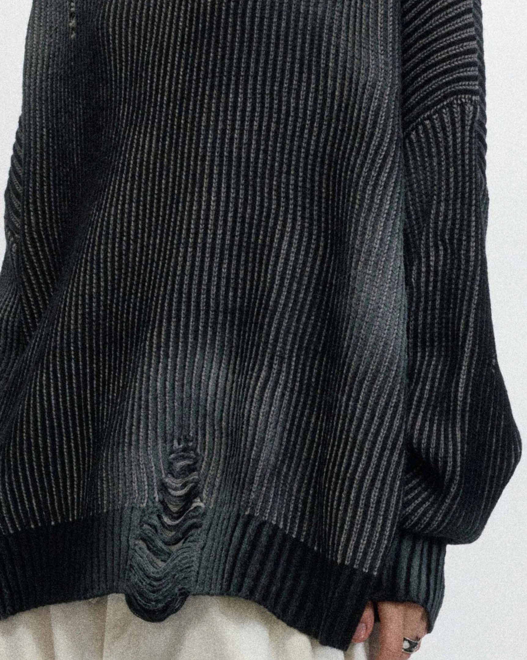 Oversized faded ribbed sweater with deconstructed hem accents for contemporary Acubi streetwear styling
