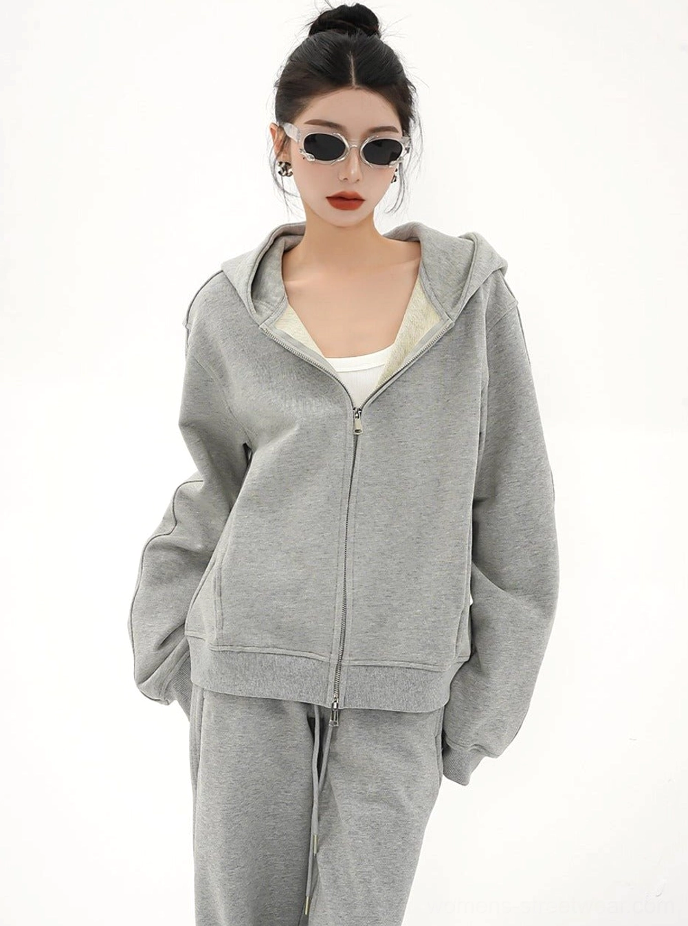 Heather gray oversized zip-up hoodie jacket for women styled with sunglasses in a minimalist Korean streetwear outfit