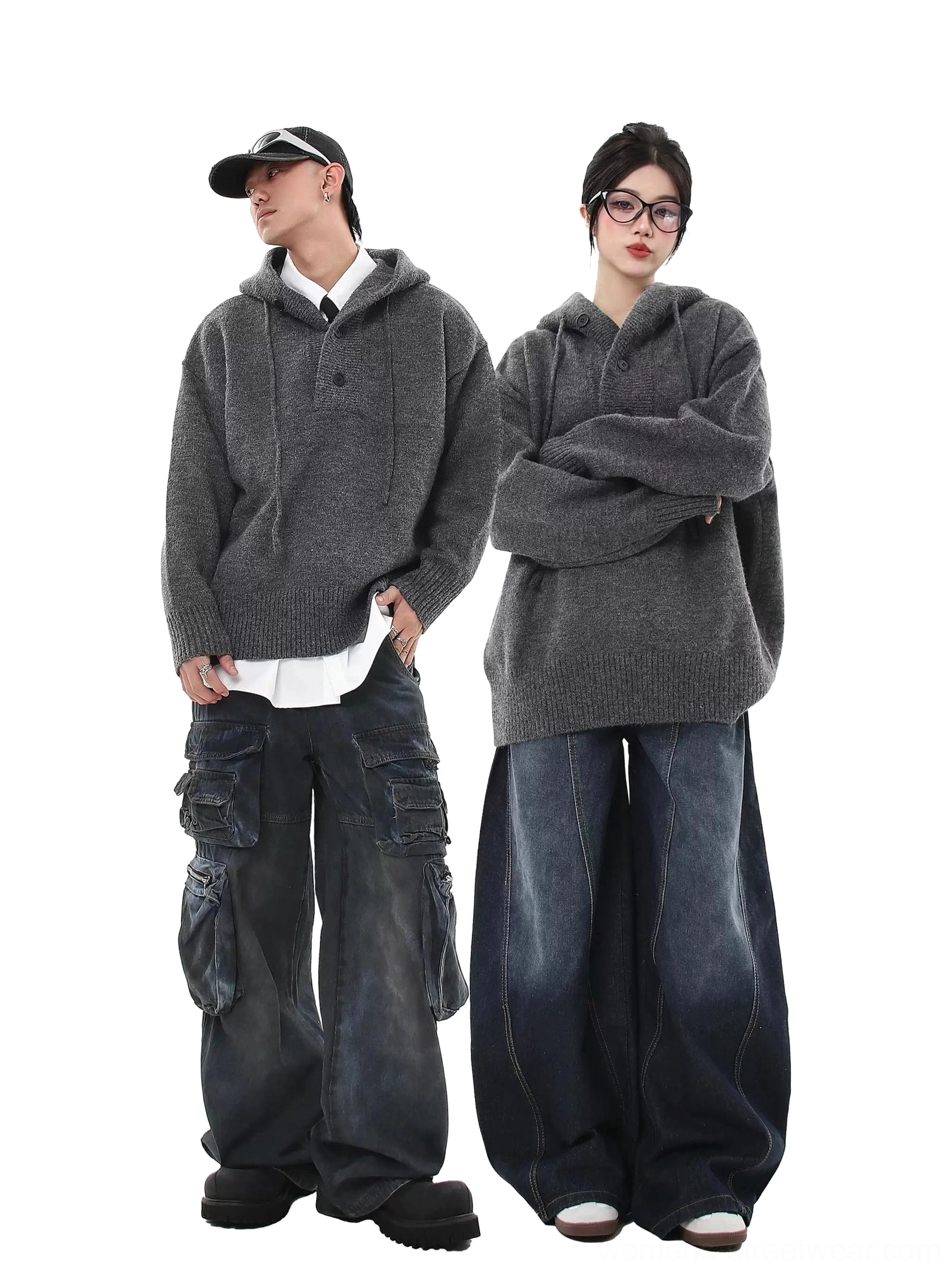 Gray oversized knit hoodie sweater with drop shoulders and ribbed trim shown in a relaxed full-body denim streetwear look