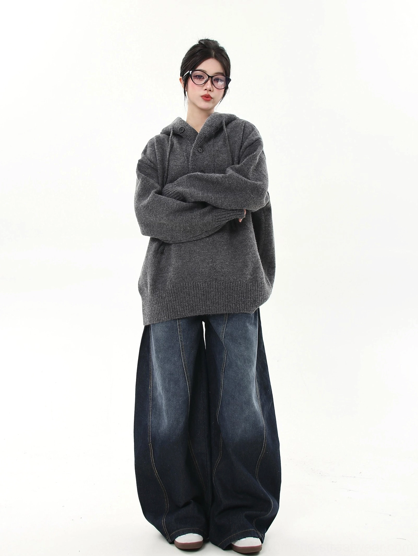 Oversized knit half-button streetwear hoodie sweater product detail view highlighting the soft mid-weight knitted blend