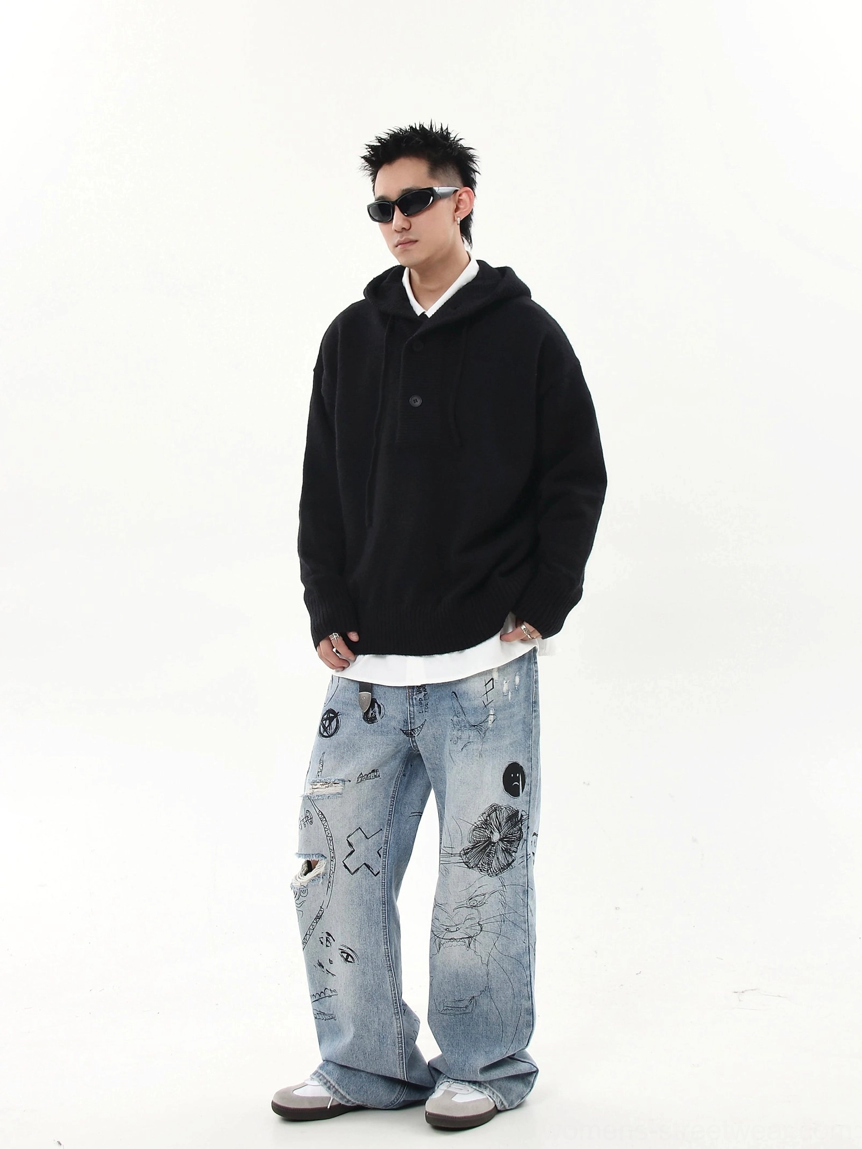 Oversized knit half-button streetwear hoodie sweater product image highlighting ribbed cuffs and relaxed balloon sleeve shape