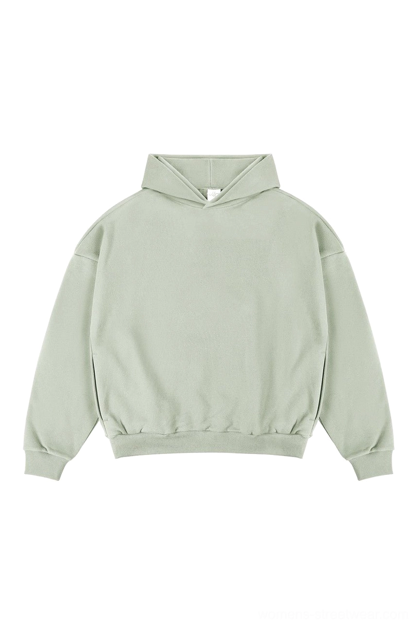 Sage green oversized Korean streetwear hoodie with relaxed dropped shoulder silhouette ribbed hem and cuffs